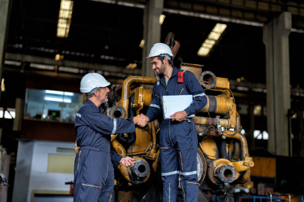 maintenance manager meet engineer checking and agreement hand check and sign on work schedule - turbo diesel imagens e fotografias de stock