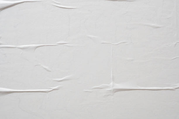 istock white crumpled and creased paper poster texture background 1425727539
