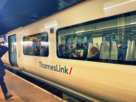 gatwick, united kingdom - March 03 2022: a train is docked at the platform of the airport railway station for the ride to london