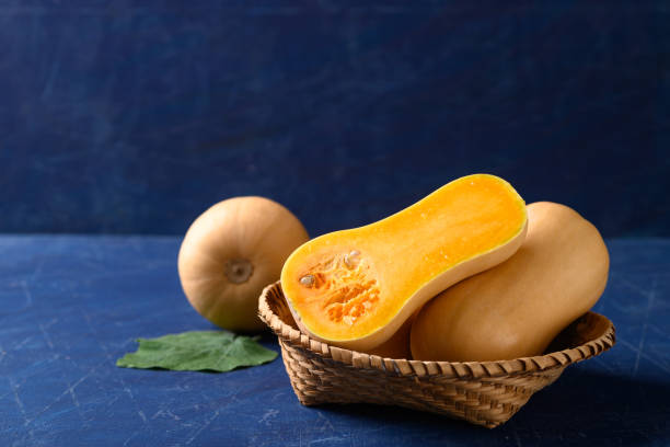 istock Butternut squash or butternut pumpkin on blue background 1425728369