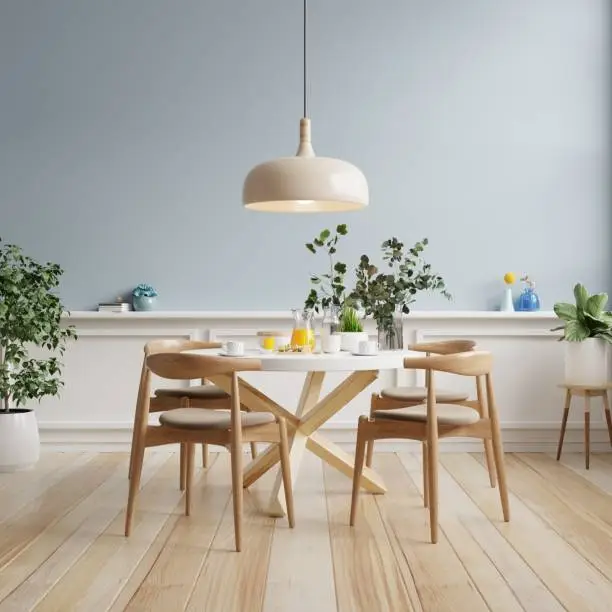 Photo of Modern dining room interior design with blue wall.