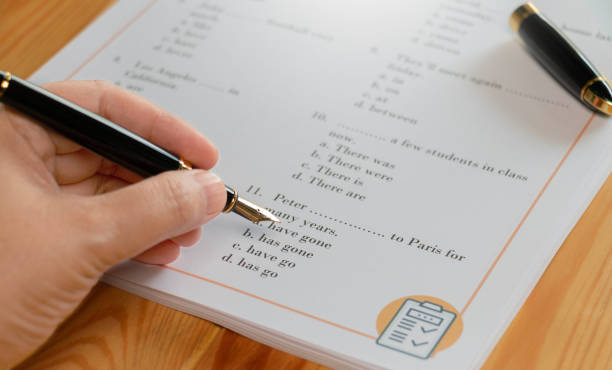 istock English test with pen on wooden table in class 1425743474