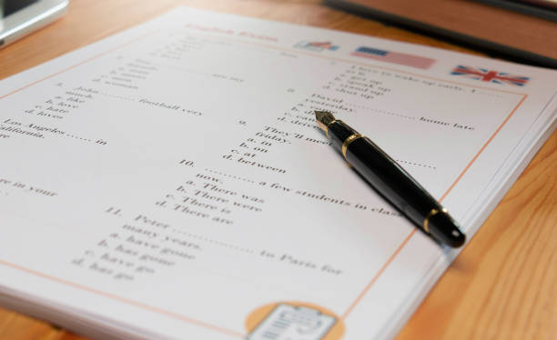 istock English test with pen on wooden table in class 1425743569