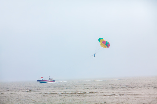jet skis and paragliders