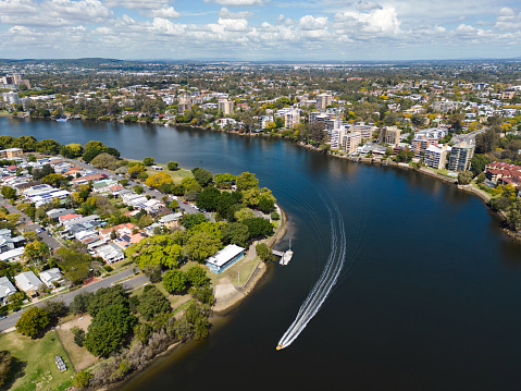 Aerial View of Brisbane River at the suburb of  West End with ferry and boat traffic
