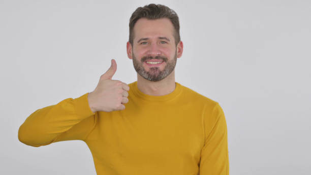 istock Middle Aged Man showing Thumbs Up Sign , White Background 1425750210