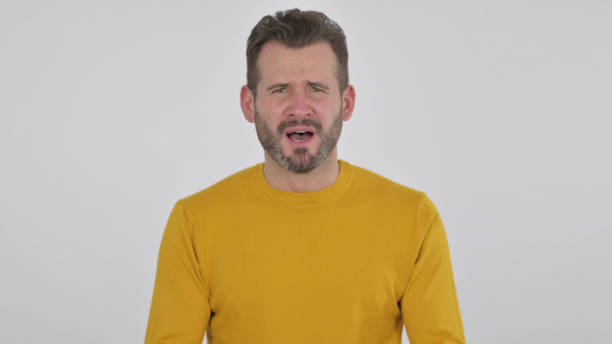 istock Disappointed Middle Aged Man Reacting to Loss , White Background 1425750305