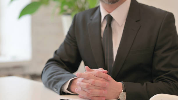 istock Close up of Hand Gesture of Middle Aged Man Talking, Explaining 1425752451