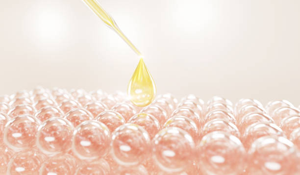istock Oli and vitamin drop on skin cell. serum through the skin layer. 1425753882
