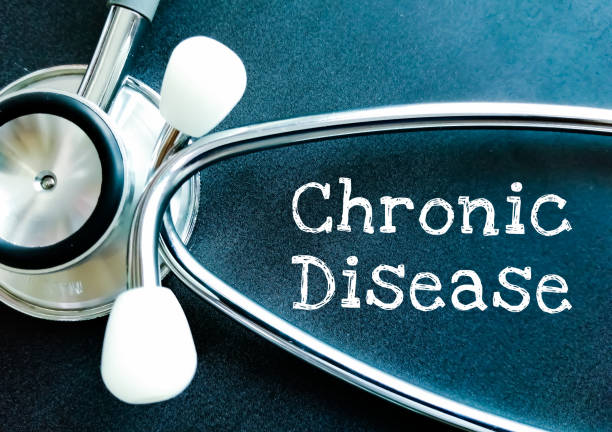 istock Chronic Disease medical term on black background with stethoscope. 1425760627