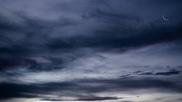 istock Crescent Moon and Star on dark Black Background 1425761112