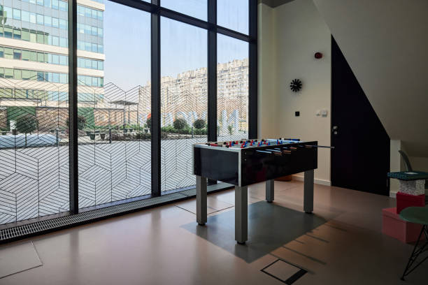 Table soccer in a modern office room.