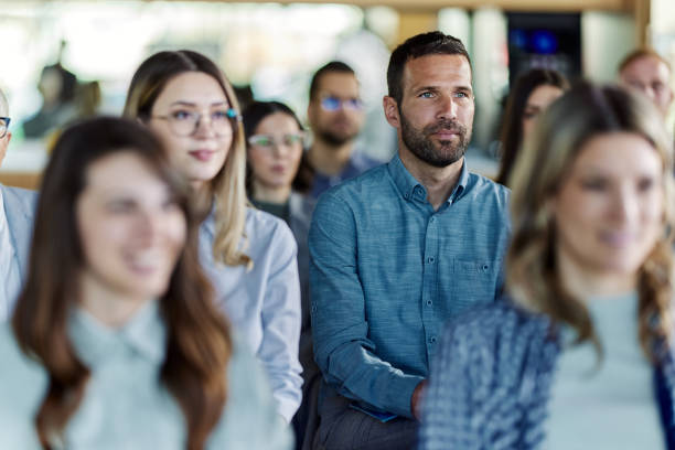 istock Entrepreneurs attending a seminar in board room. 1425764573