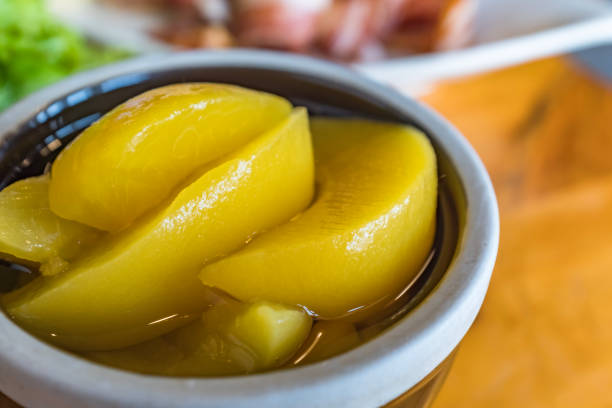 Canned peaches in sugar water