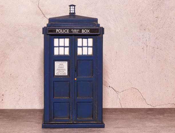 Police call box notebook isolated on wall background. Tardis from Doctor Who. Space for text. stock photo