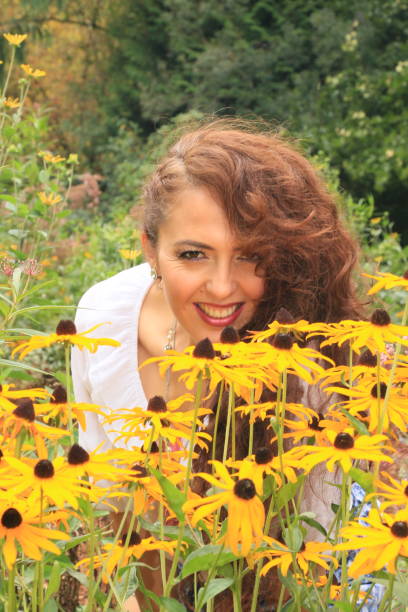 istock Flowers and Woman 1425770804
