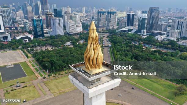 Close Up Of Golden Fire On The Top Building National Monument The Icon Of Jakarta Indonesia Stock Photo - Download Image Now
