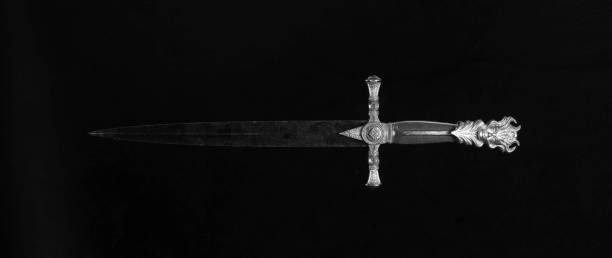 istock king sword isolated on black background 1425776238