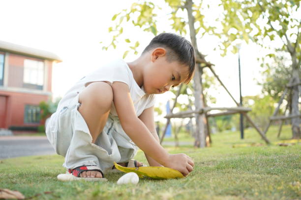 istock Asian kids having fun playing games outdoors 1425776516