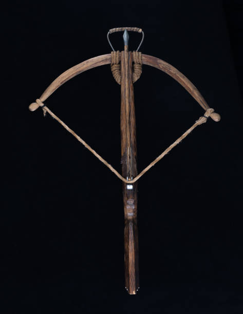 istock ancient crossbow isolated on black background 1425777477