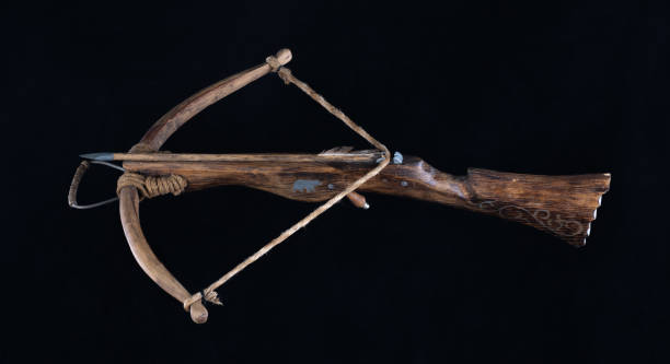 istock ancient crossbow isolated on black background 1425777682