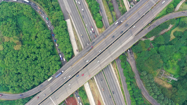 istock Aerial top down view on massive multi-level interchange on Jakarta city on a sunny summer day with light traffic 1425778025