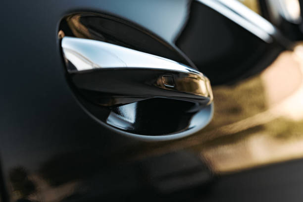 istock Modern luxury car exterior door handle close up 1425778099
