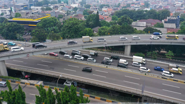 istock Road system. Road interchanges. Multi-level highways. The movement of vehicles on highways in different directions. View of multi-level roads from a height 1425778197