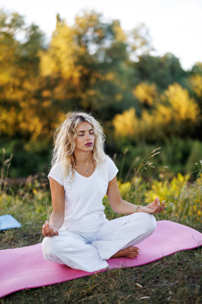 istock Meditation by the water 1425780847