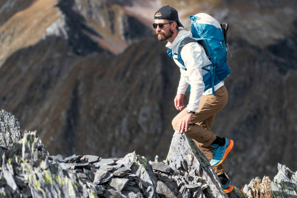 istock Sportsman among mountain boulders 1425781785