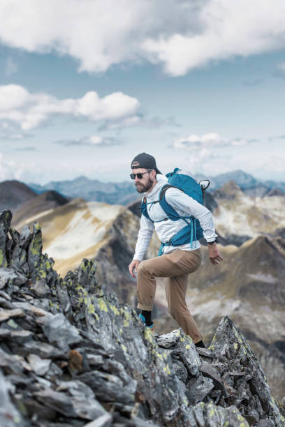 istock Man walks in the wild mountain 1425781908