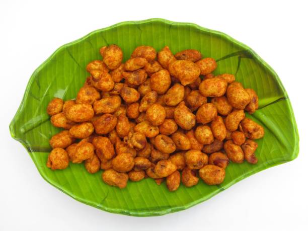 istock Peanut masala fry in a plate on white background 1425783966