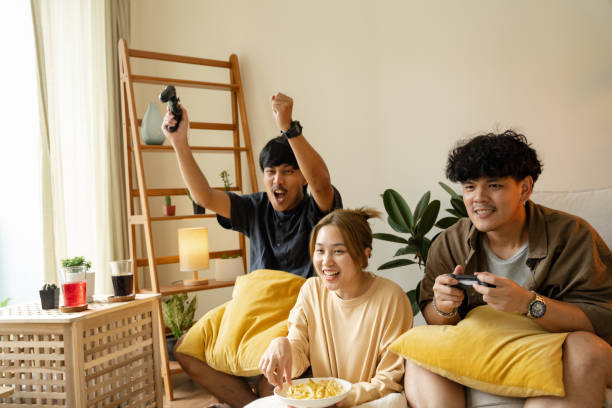 istock Asian people are playing games with friends with fun. 1425790433