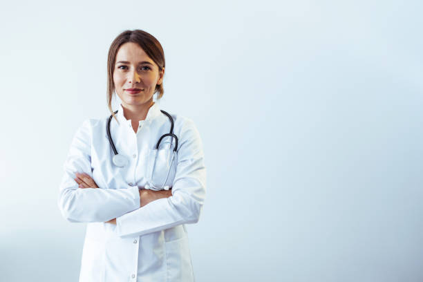 istock Successful female doctor isolated on white background 1425798758