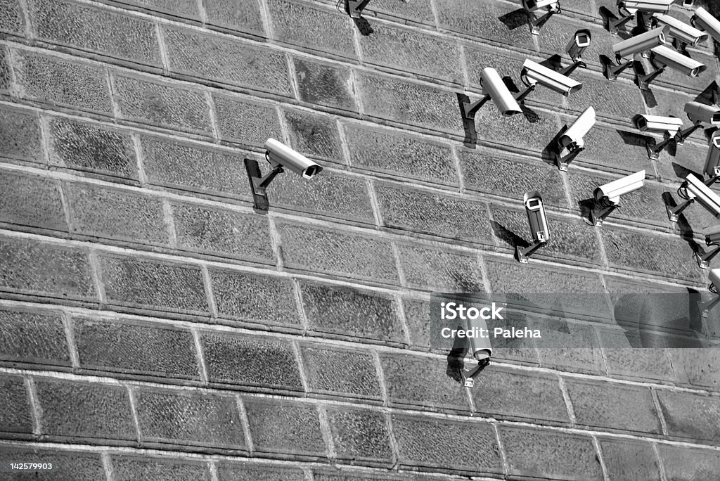 Big Brother Security Cameras On The Brick Wall Alertness Stock Photo