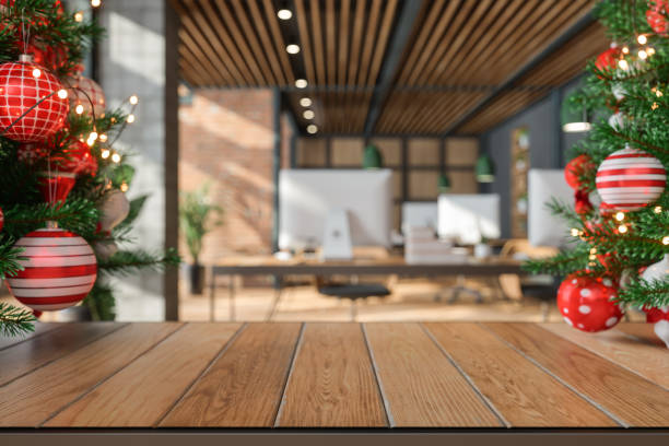 istock Empty Wooden Surface With Christmas Decoration And Blurred Office Background 1425803017