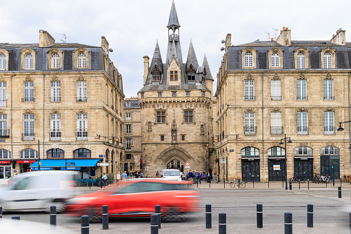 Bordeaux, France - April 27, 2022: La porte Cailhau or Calhau Gate monument located along Garonne river downtown Bordeaux city in France