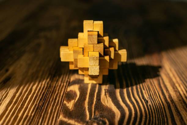 ウッドパズル、脳の体操、木製のロジックゲーム3dブロック - cube puzzle three dimensional shape block ストックフォト��と画像