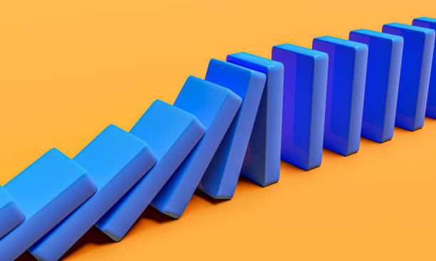 istock The blue blocks domino are pushing. Trends and problems concept 1425812591