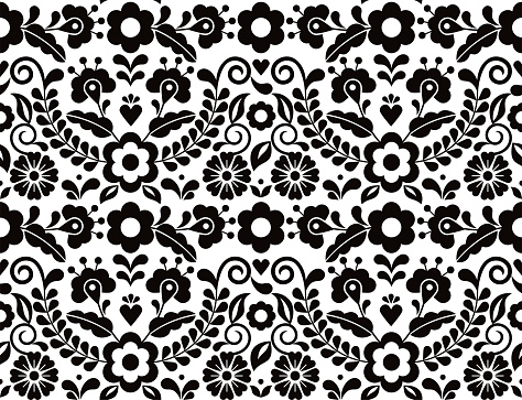 Seamless vector pattern with Mexican floral morif, black and white textile or fabric print design inspired by traditional embroidery crafts from Mexico
