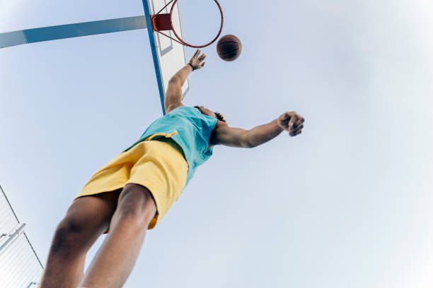 Sporty Man Playing Basket