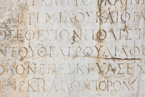 Ancient greek text marble carving. Ephesus excavation site. Turkey