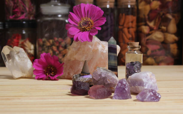 istock Amethyst Crystals With Flowers and Incense Cone on Meditation Table 1425820135