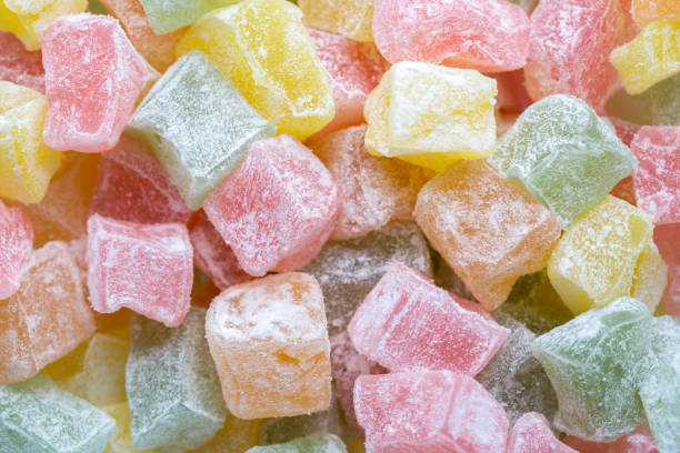 istock Closeup of multicolored cubes Turkish delight (Lokum). Selective Focus. Flat lay. 1425820476