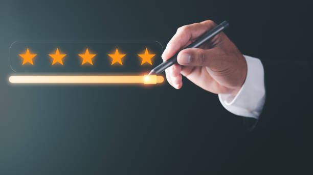istock satisfaction rating customer service The best business scoring experience positive feedback Great Star Achievement Assessment business man pointing pen to five star review rating slider button 1425821308