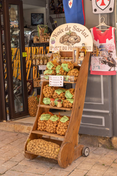 Nuts of Sarlat in Sarlat-la-Caneda, France Sarlat-la-Caneda, France - April 30 2022: Nuts of Sarlat famous regional product in Sarlat-la-Caneda, France sarlat la caneda stock pictures, royalty-free photos & images