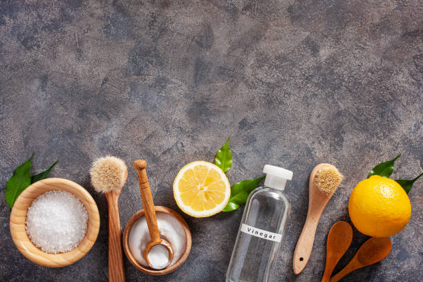 istock zero waste eco friendly cleaning concept. wooden brushes, lemon, baking soda, vinegar 1425825187