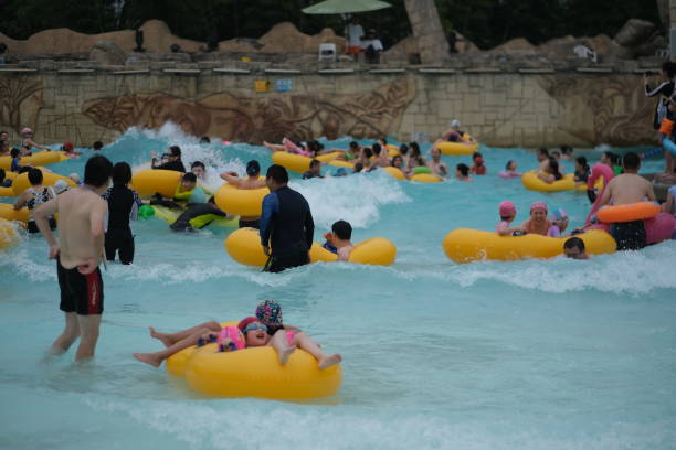 Shanghai,China-July 16th 2022: many Chinese people playing happily at water park in summer