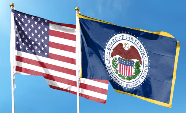 istock Twin Flags USA and Federal Reserve System, Fed Waving Flags with Textured Background 1425828545