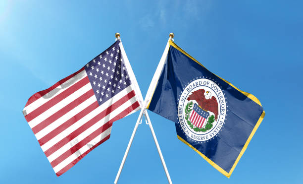 istock Twin Flags USA and Federal Reserve System, Fed Waving Flags with Textured Background 1425835603